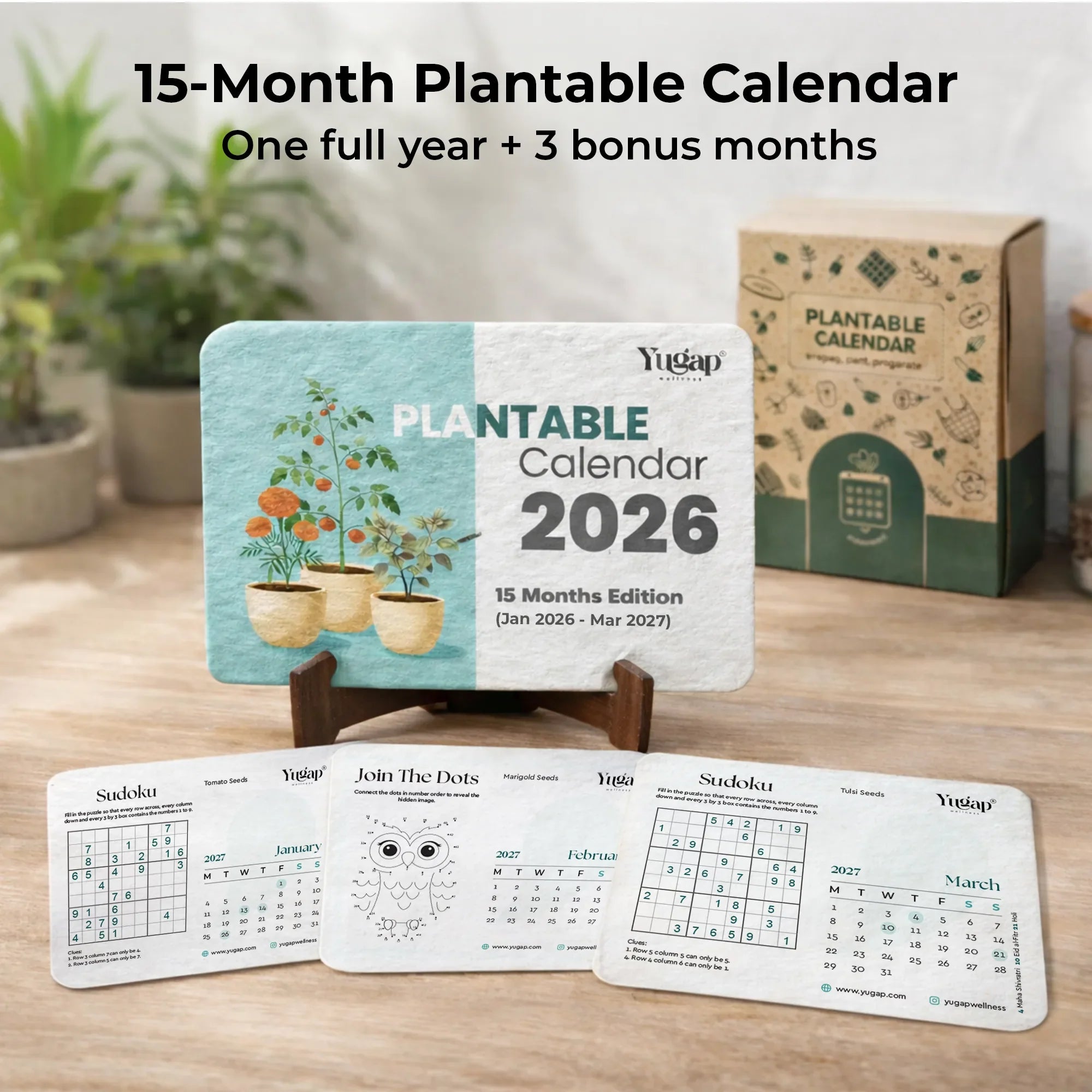 15-Month Plantable Calendar 2026 with stand and additional cards on a wooden surface.