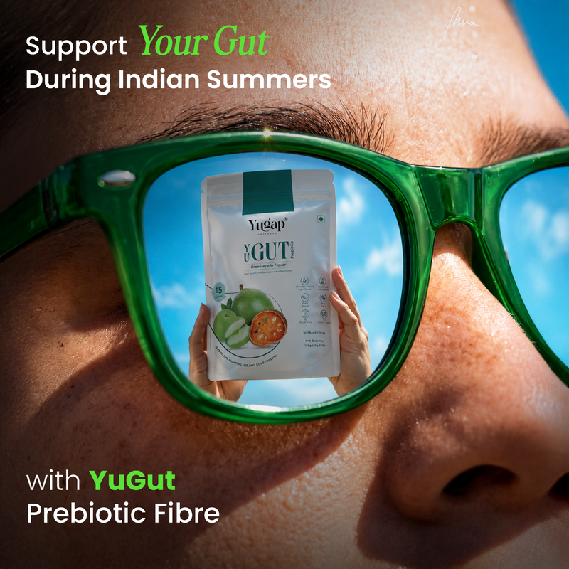 Person wearing green sunglasses with YuGut prebiotic fibre sachet reflected in the lens for gut health support during Indian summers.