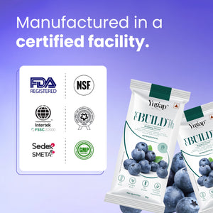 Blueberry collagen skin supplement sachets with FDA, NSF, GMP, SMETA, and FSSC certified facility badges on a purple background